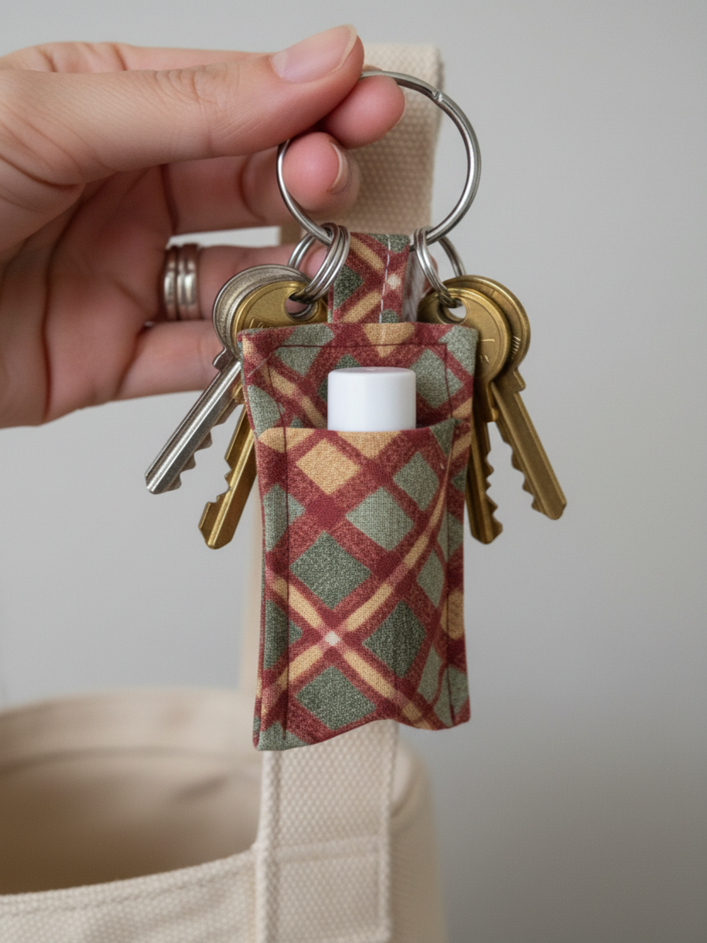 Tartan keyring lip balm holder with keys attached