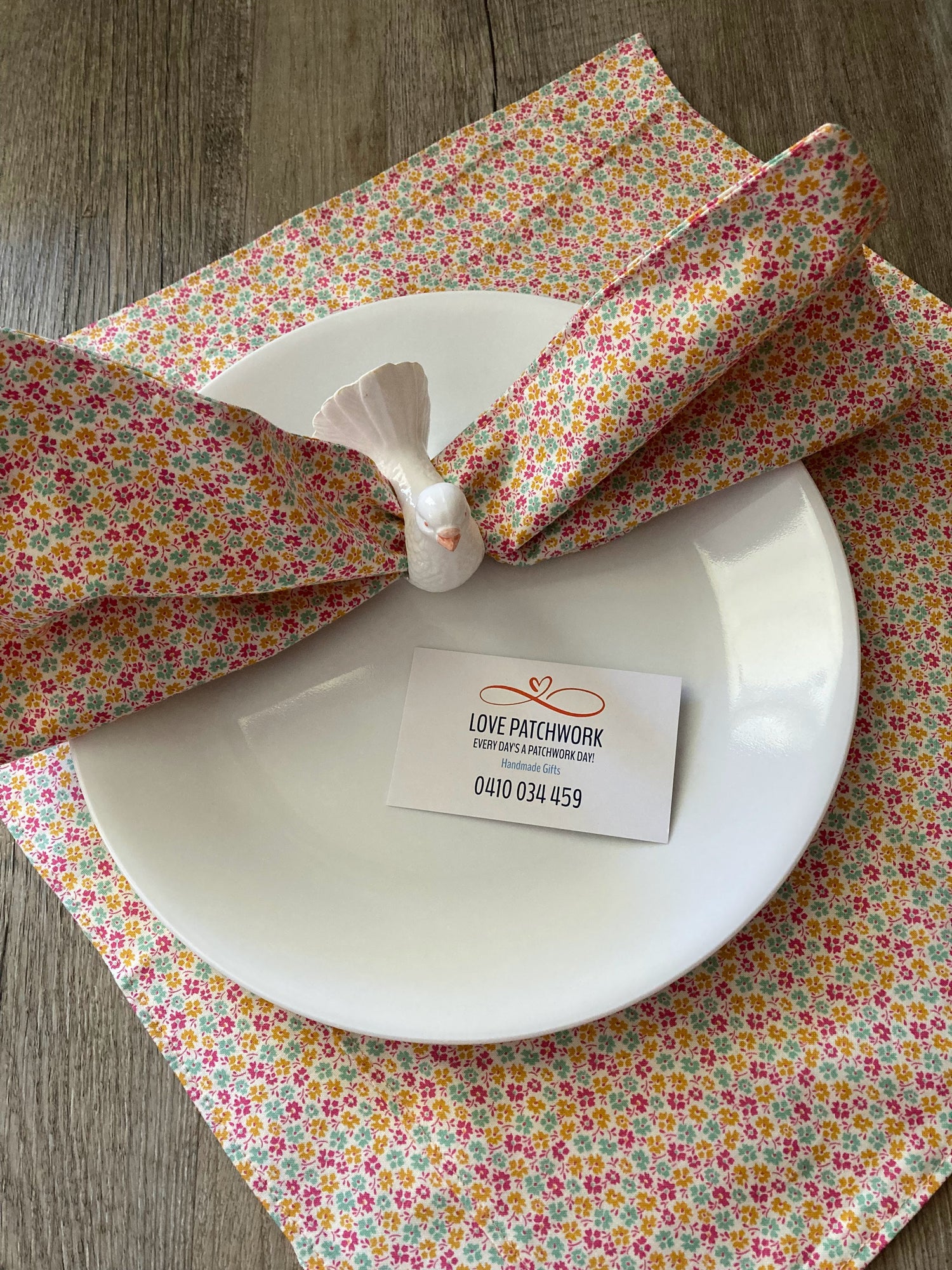 Reusable cotton serviettes with dove serviette rings