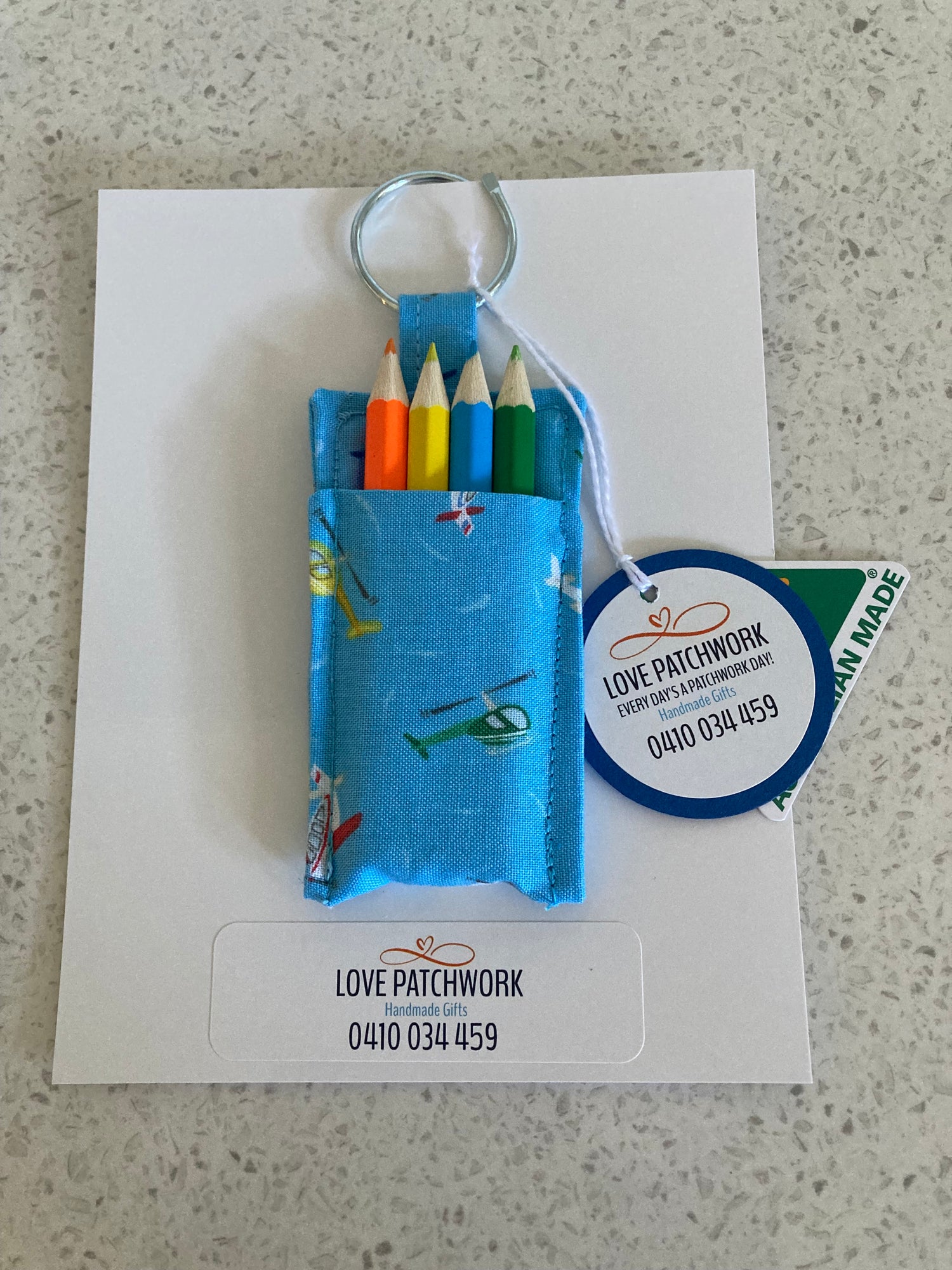 Handmade novelty keyring holders for lip balm and small essentials - compact cotton fabric accessories made in Australia