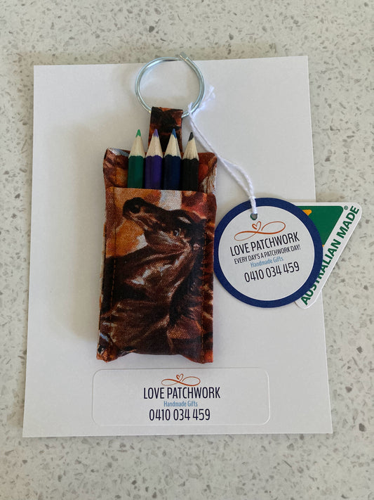 Keychain with pencil holder featuring equestrian design, on a white card with 'Love Patchwork' branding. Australian Made