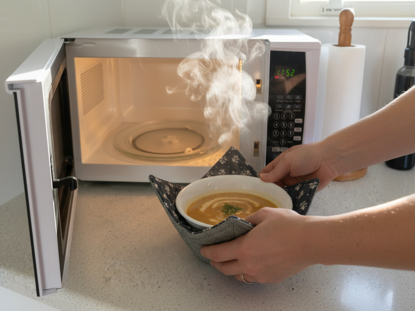 Grey microwave bowl holder in use